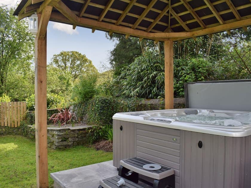 Relax in the secluded and private hot tub | Maes yr Onnen, Abercych, near Cardigan