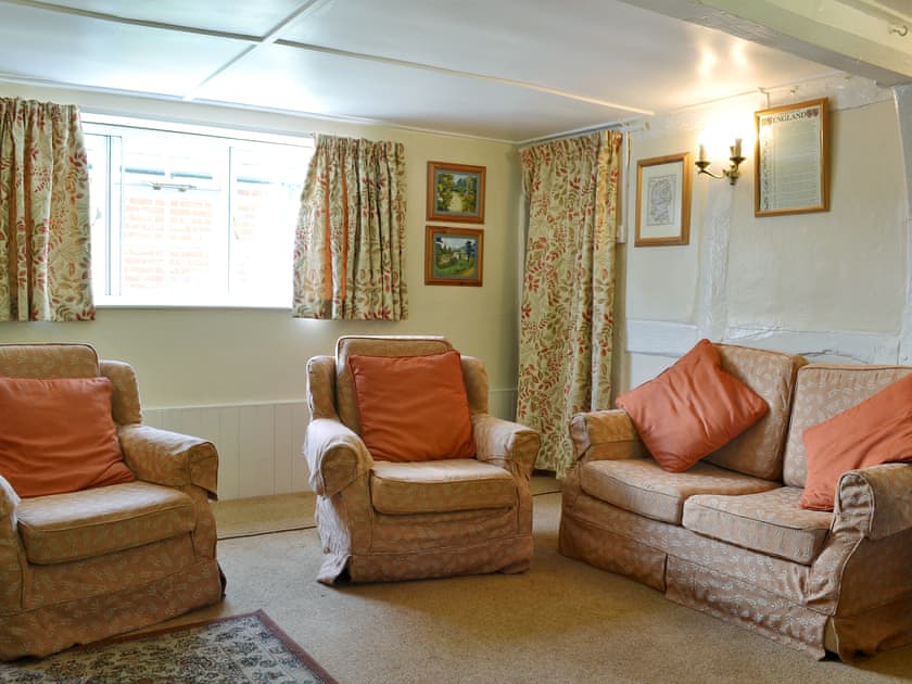 Light and sunny living/dining room with open fire | October Cottage, Aughton, near Marlborough