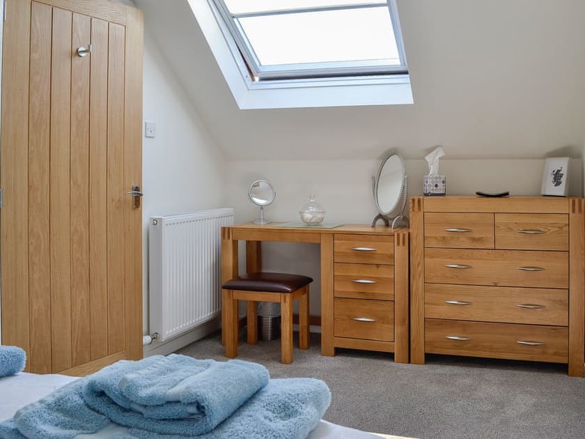 Lovely double bedroom with sloping ceiling | Little Cottage, Wigtown