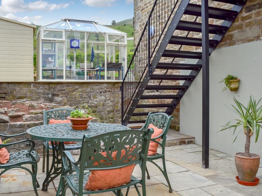 Spacious patio with sitting out area | Alphin Apartment, Mossley