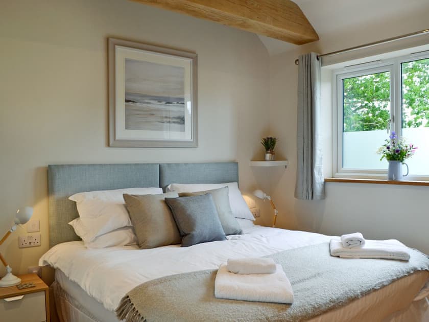 Sumptuous double bedroom with beams | Poachers View - Netherfield Hill Farm, Netherfield, near Battle