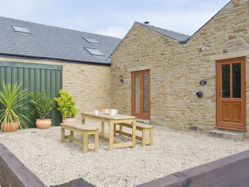 Lovely holiday home with enclosed gravelled patio area | Woodpecker Cottage - Corgill Farm Cottages, Bolton-by-Bowland