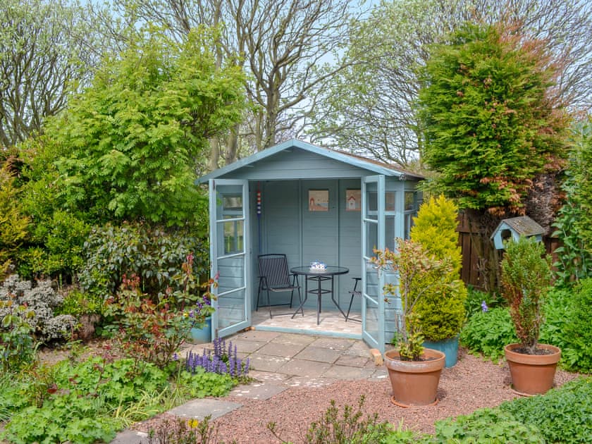 Attractive garden | Summerhouse Cottage, Beadnell, near Seahouses