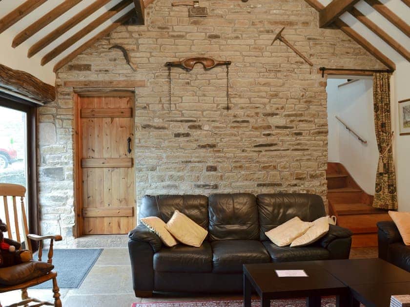 Comfortable living room with high beamed ceiling | Spring Cottage, Hollinsclough, near Buxton