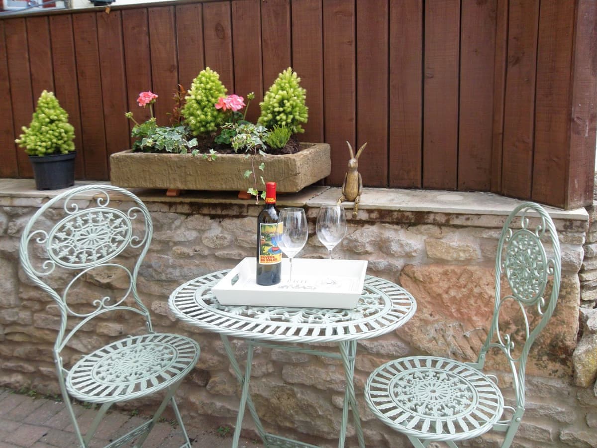 Patio area Bedroom at West Wood Hideaway ( Ref UK2505 ) Wrelton Holiday cottage in North Yorkshire