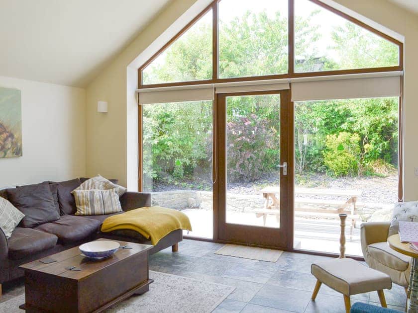 Comfy seating within the living area | Lili Wen - Neuadd Wen Cottages, Llanfachraeth, near Holyhead