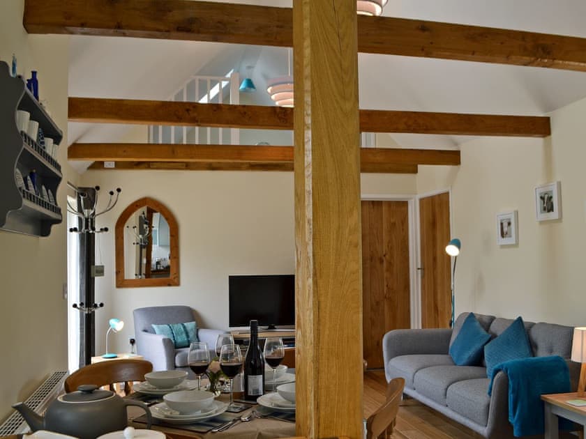 Beautifully presented open plan living space with beams | Cornbrash Farm Cottage, Earlsdown, near Heathfield
