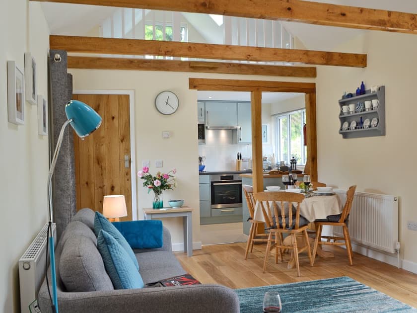 Beautifully presented open plan living space with beams | Cornbrash Farm Cottage, Earlsdown, near Heathfield