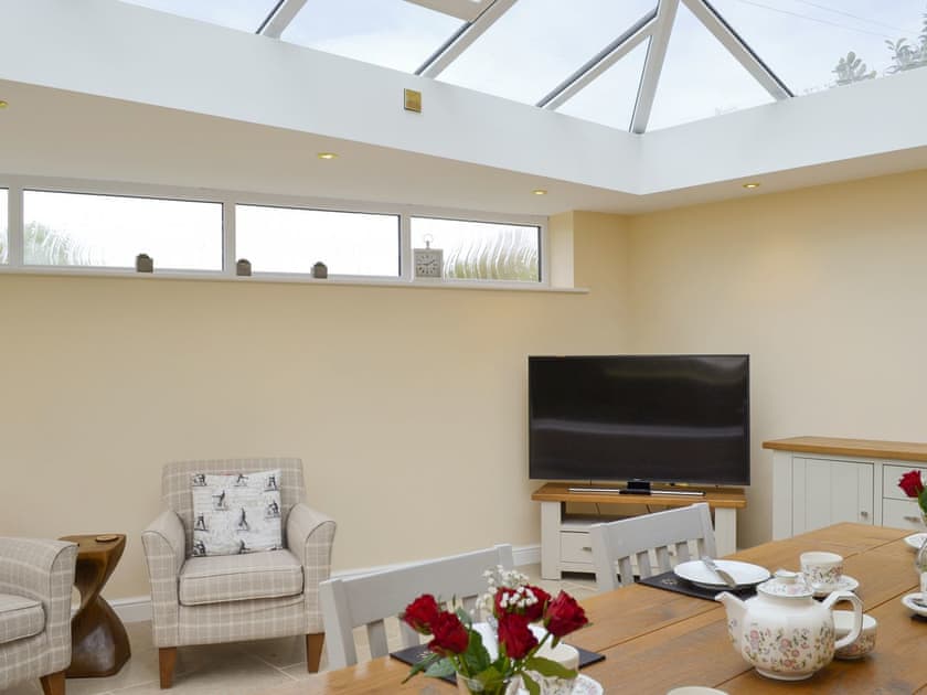Light and airy ‘orangery’ dining room | The Gatehouse - Eldin Hall Cottages, Scarborough