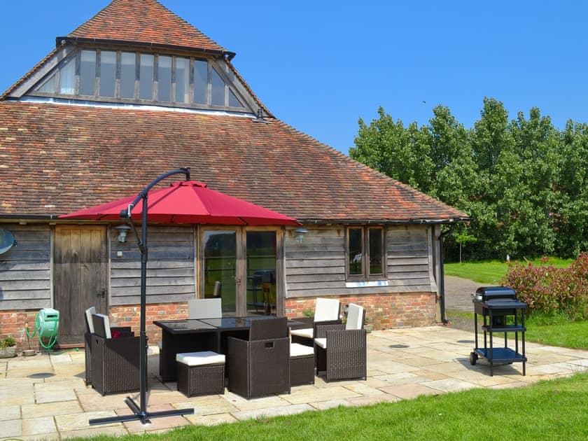 Fantastic patio area with sitting out furniture | Romden Barn, Smarden, near Ashford
