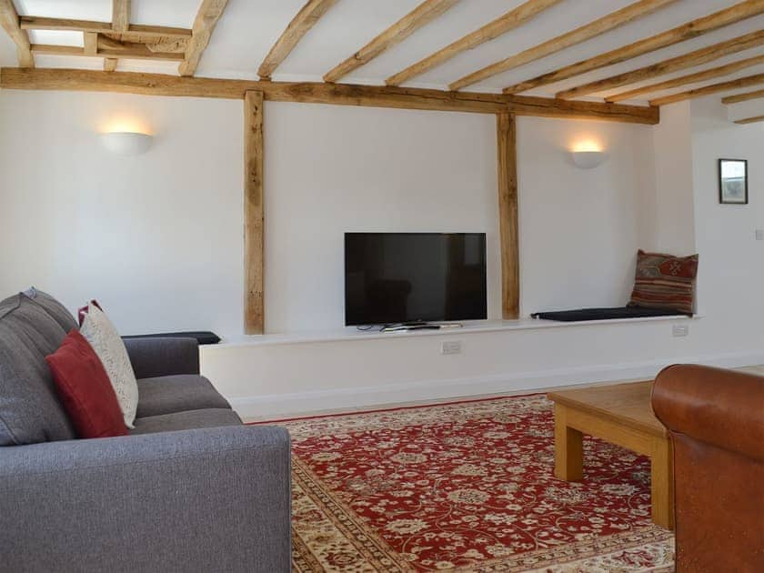 Characterful living room with original beams | The Hop Cottage - Castle Properties, Ashperton, near Ledbury