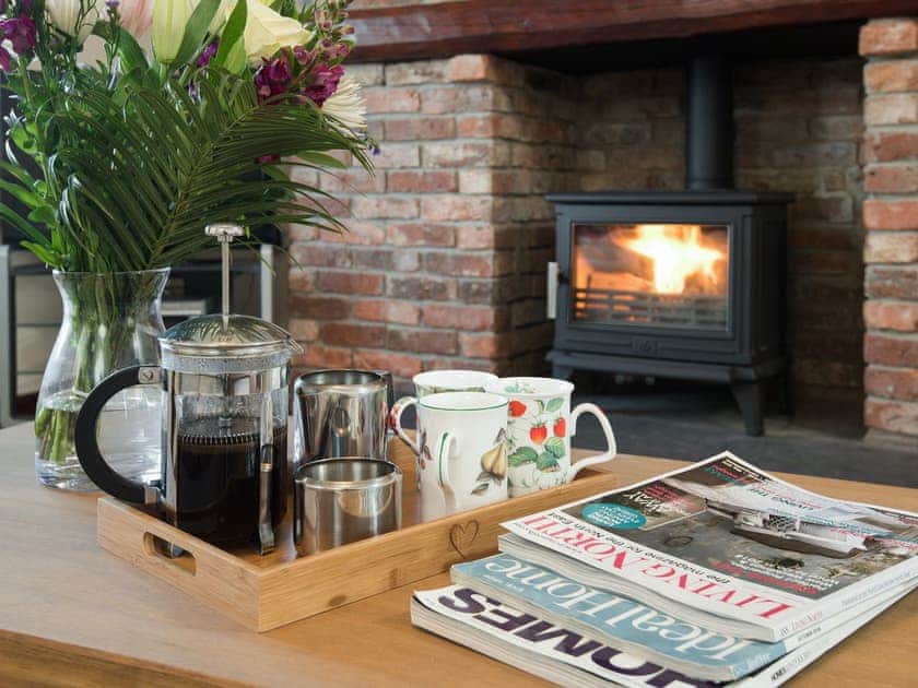 Welcoming living room | Dunstanburgh View - Proctors Stead Cottages, Dunstan, near Craster