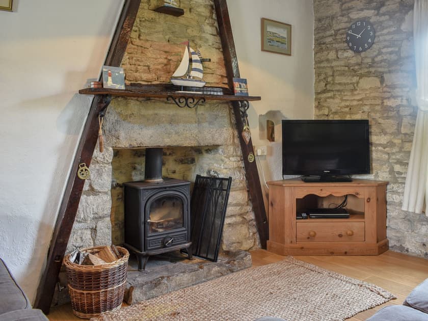 Characterful living room with wood burner | Herston Rise, Swanage