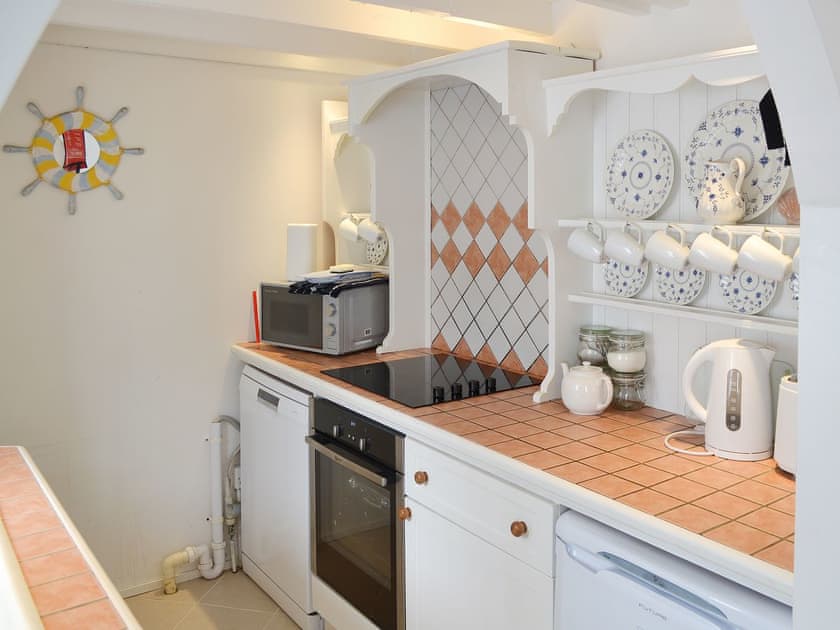 Modest kitchen area | Beach Corner Cottage, Gorran Haven, near St Austell