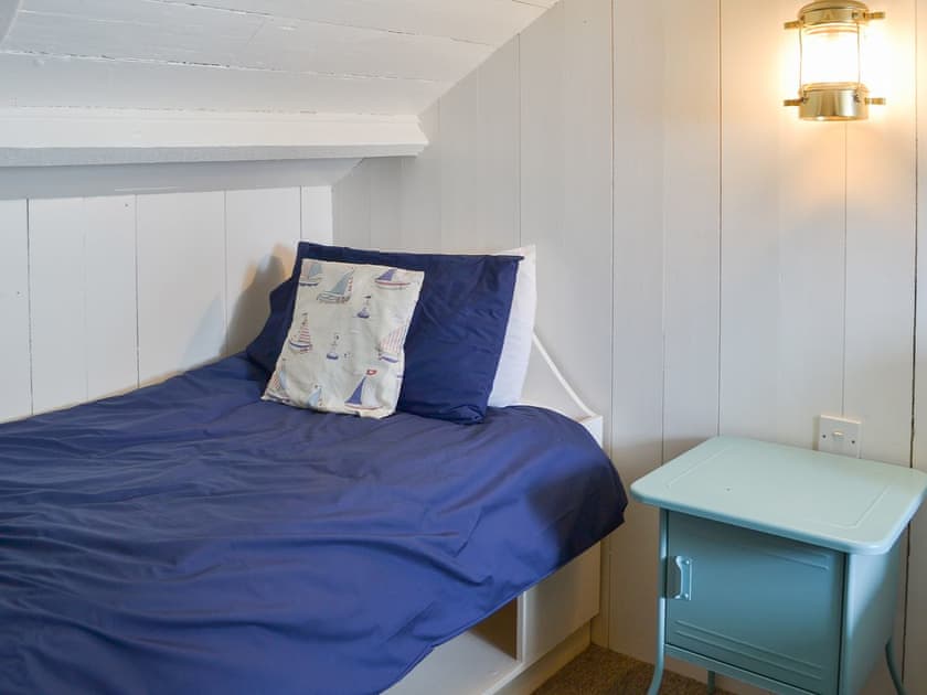 Twin bedroom with sloping ceilings | Beach Corner Cottage, Gorran Haven, near St Austell
