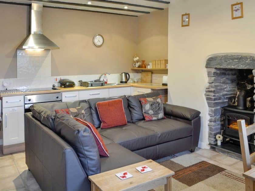 A well-equipped kitchen completes the open plan living space | Tan y Bryn, Prenteg, near Porthmadog