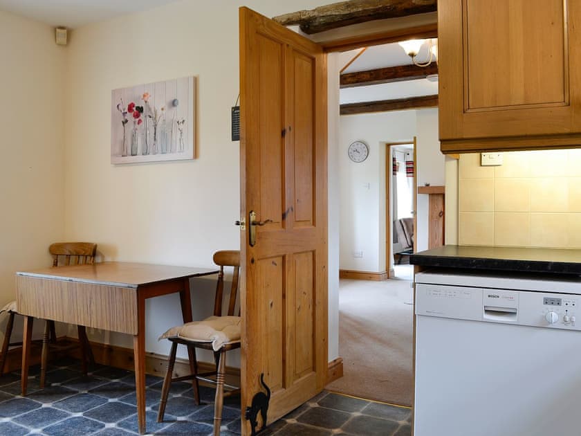 Kitchen with table and chairs | Farm Cottage - Springfield Farm Cottages, Bigrigg, near Egremont
