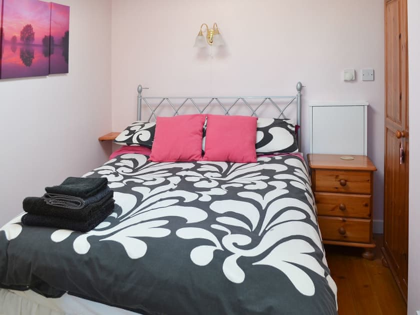 Styllish contemporary double bedroom | Longstone Bungalow, Beadnell