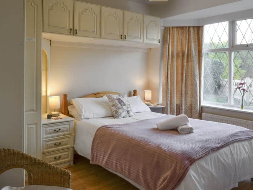 Peaceful double bedroom with ample built-in storage | The Glade, Ferring, Worthing