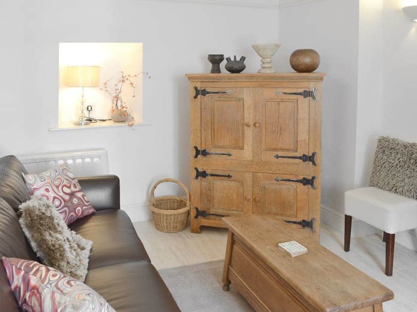 The lovely beamed living room | Oaken Cottage, Mousehole, Penzance