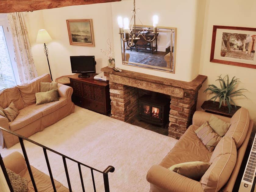 Living area with gas ’woodburner’ and exposed beams | Dewsnaps Frost - Dewsnaps, Chinley, near Chapel-en-le-Frith