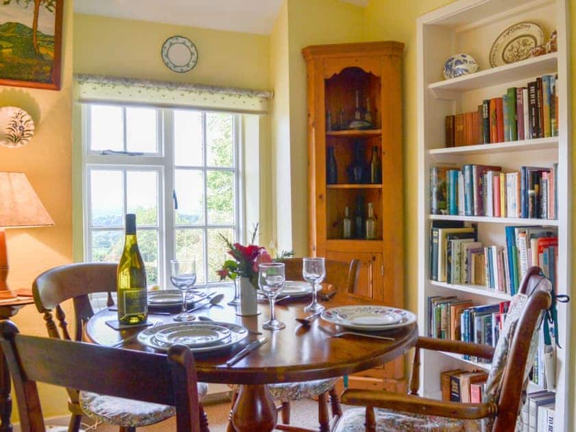 Modest yet light and airy dining room | Upper Stanbatch Cottage, Wentnor, near Bishops Castle