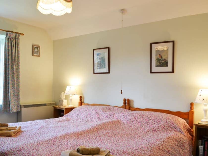 Twin bedded room | Upper Stanbatch Cottage, Wentnor, near Bishops Castle