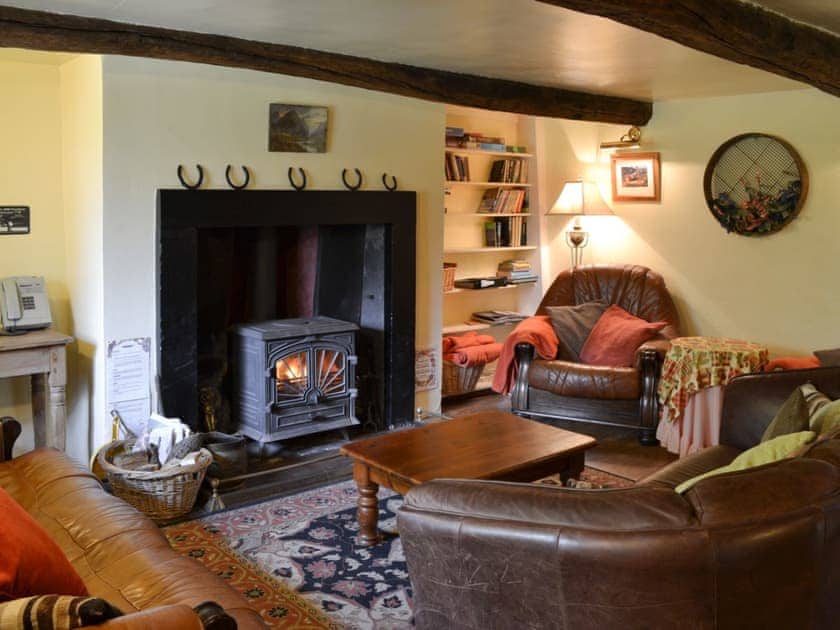 Living room with wood burner | Ganny House - Ganny Cottages, Birkerthwaite, Birkermoor