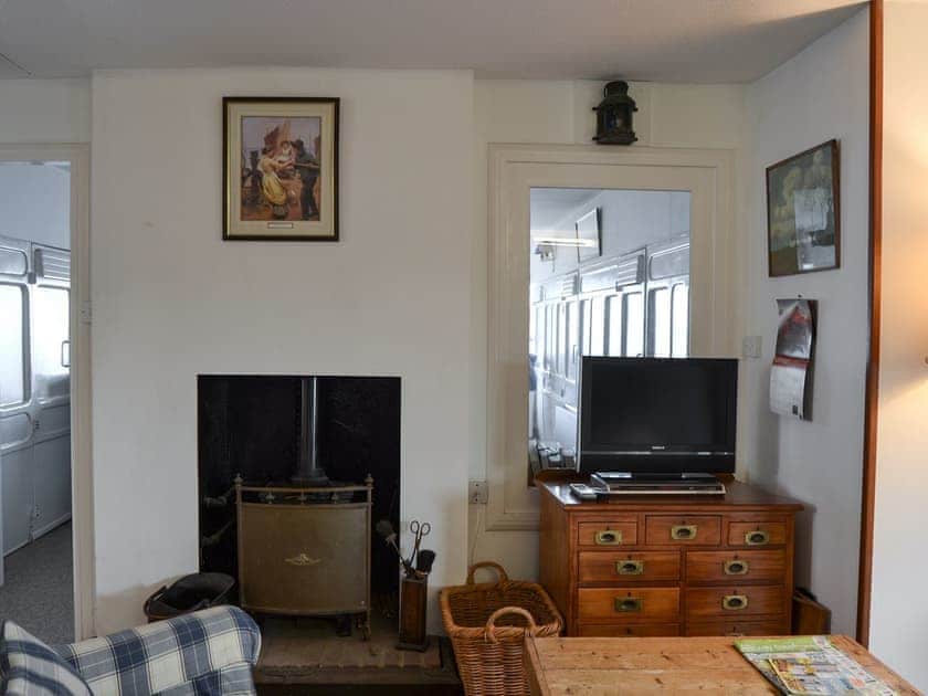 Living room with wood burner | Thalassa, Pagham, near Chichester