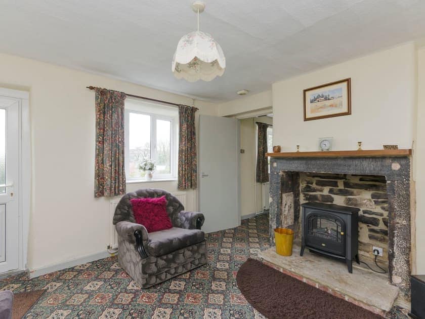 Feature fireplace in living room | Bank Top Cottage - Church Bank Cottages, Hathersage