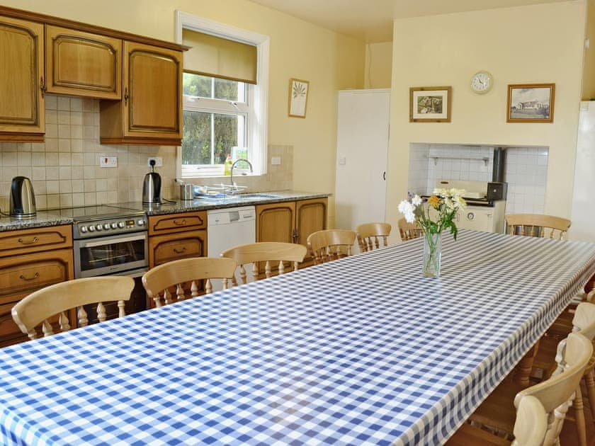 Kitchen with dining area | Thurlibeer House, Launcells, near Bude
