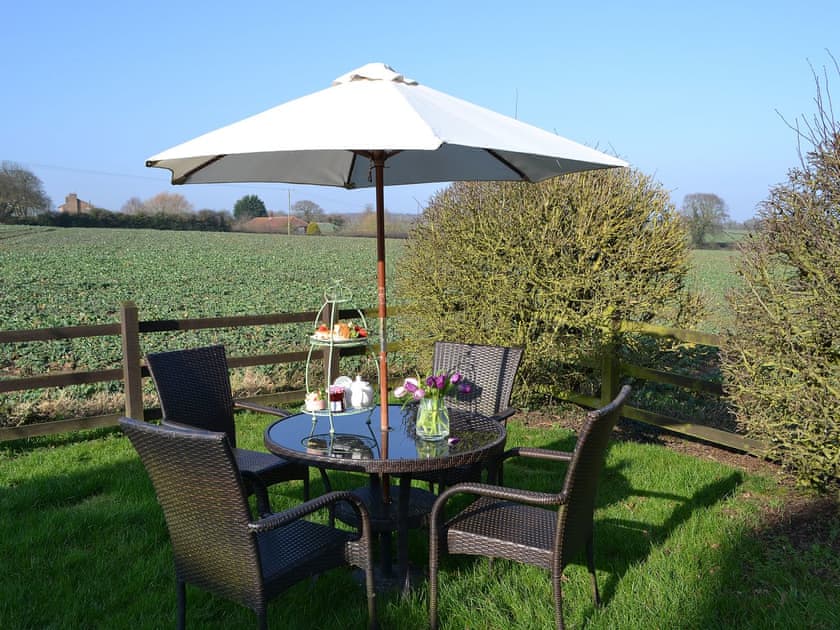 Lovely sitting-out-area with wonderful views | Restwell, Southrepps