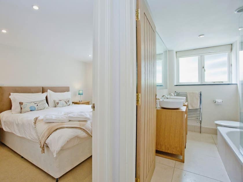 Double bedroom and bathroom | Lower Trevorder Barns - The Mill House, Mount, nr. Bodmin