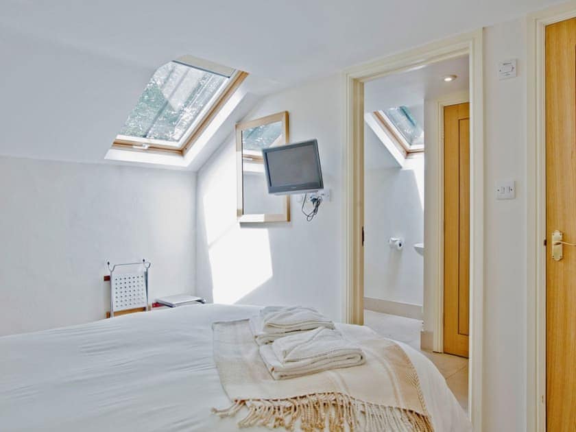 Double bedroom and bathroom | Lower Trevorder Barns - The Mill House, Mount, nr. Bodmin