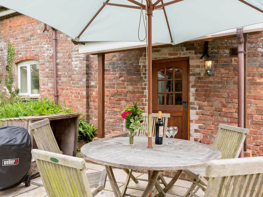 Outdoor dining area | Coach House, Wareham