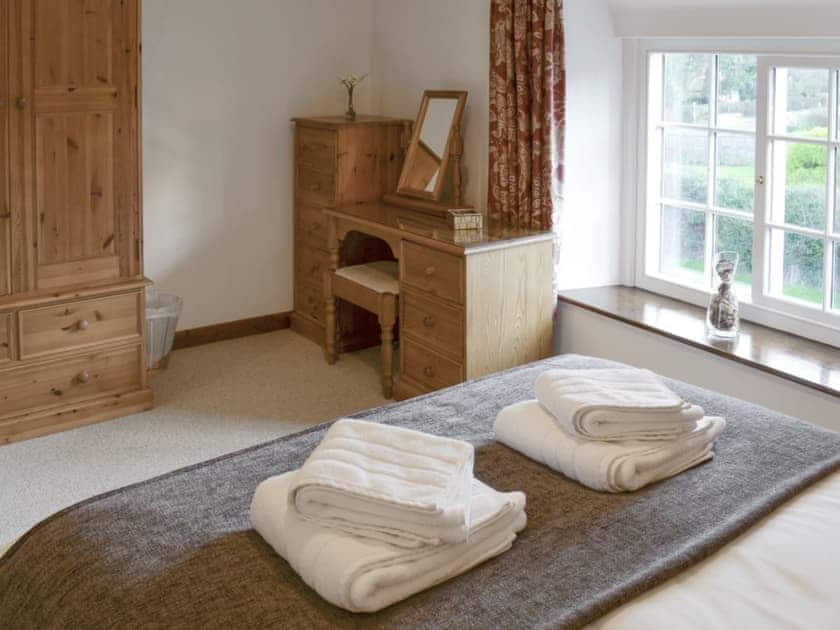 Ample storage and dressing area within double bedroom | Daisy Cottage, Thornton-le-Dale