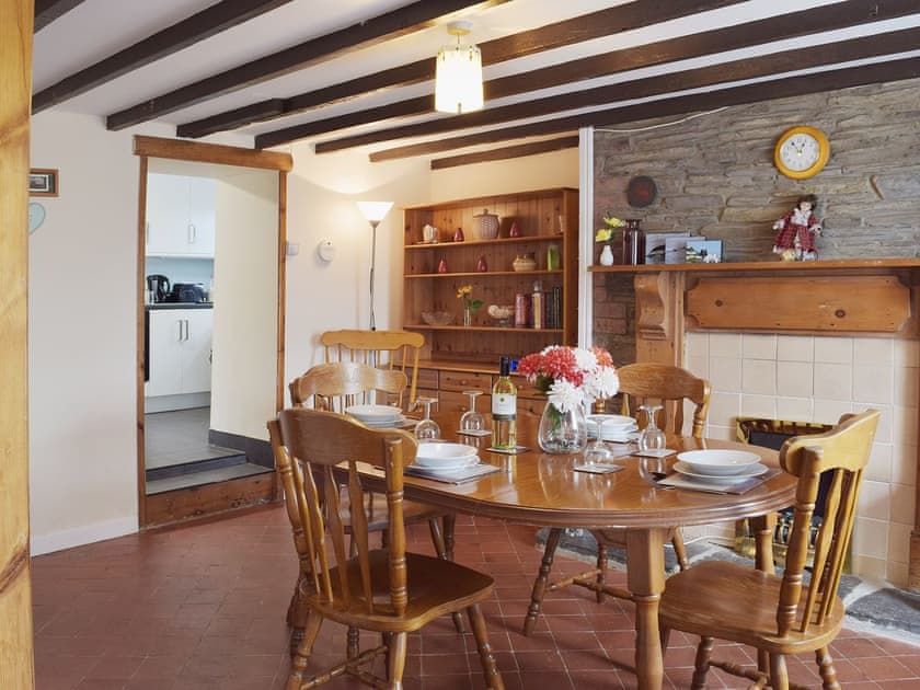 Tile-floored dining room | Parcllwyd Cottage, Cilgerran, near Cardigan