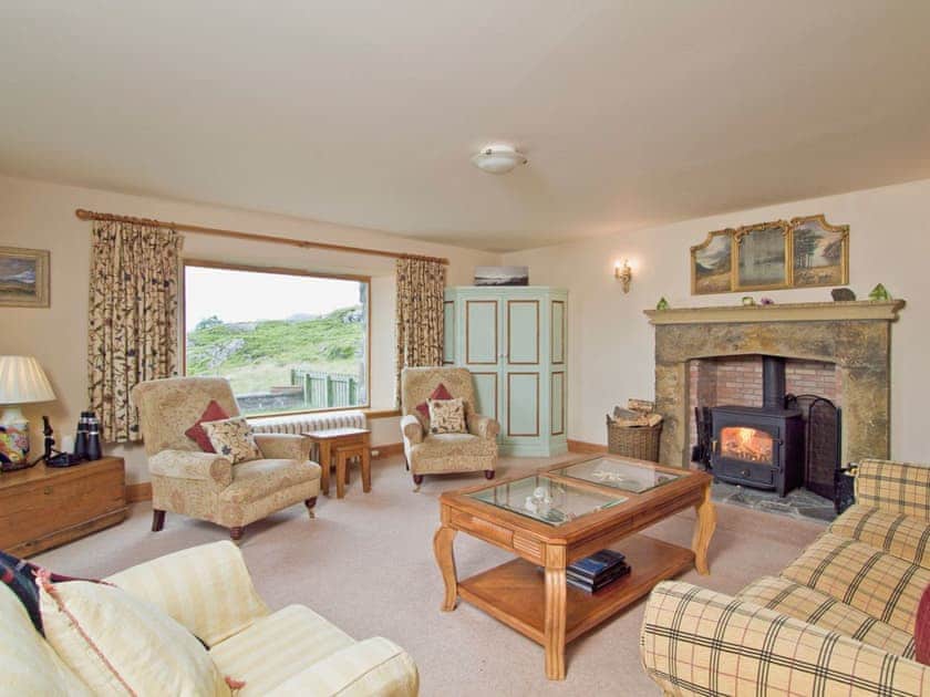 Spacious living/dining room with wood-burning stove and sea views | Rubha Lodge, Shieldaig
