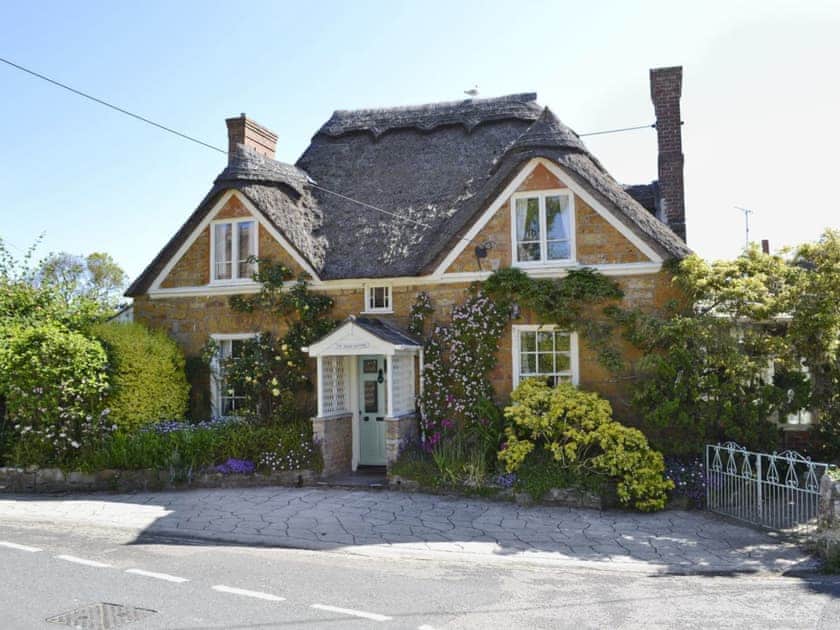 Charming, Grade II listed, thatched cottage | Swiss Cottage, Chideock, near Bridport