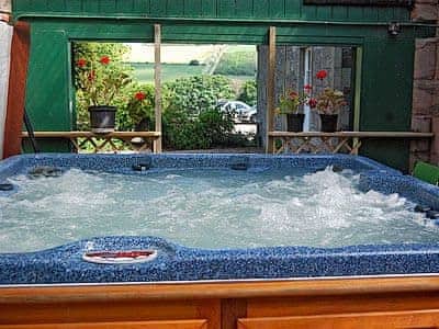 Hot tub | Lochside Stable House, Yetholm, nr. Kelso