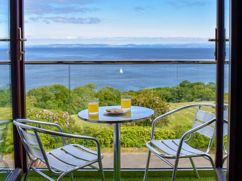 Balcony with wonderful sea views | Woodlea Cottage 1, Dippen, near Whiting Bay, Isle of Arran