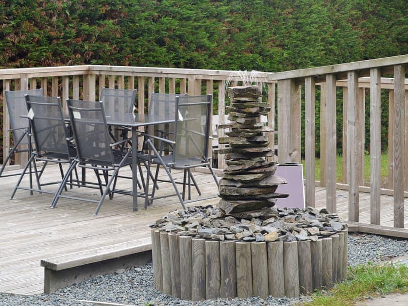 Decked area and adjacent water feature | Bevan House, Hundred House, near Builth Wells