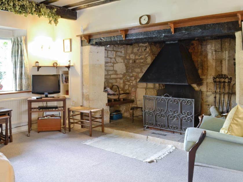 Outstanding heritage fireplace in lounge | Rose Cottage, Westington, Chipping Campden