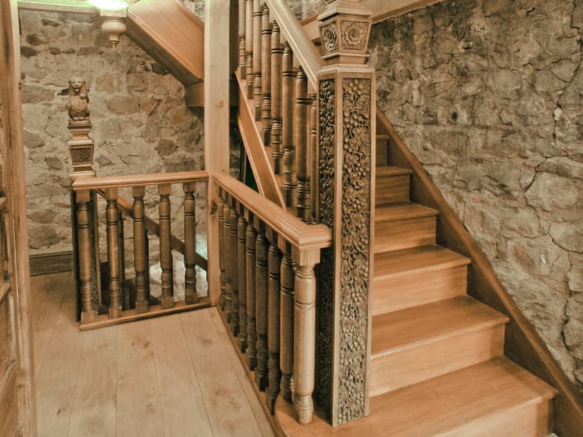 Hand-carved mahogany staircase  | Hen Wrych Hall Tower, Abergele, Conwy
