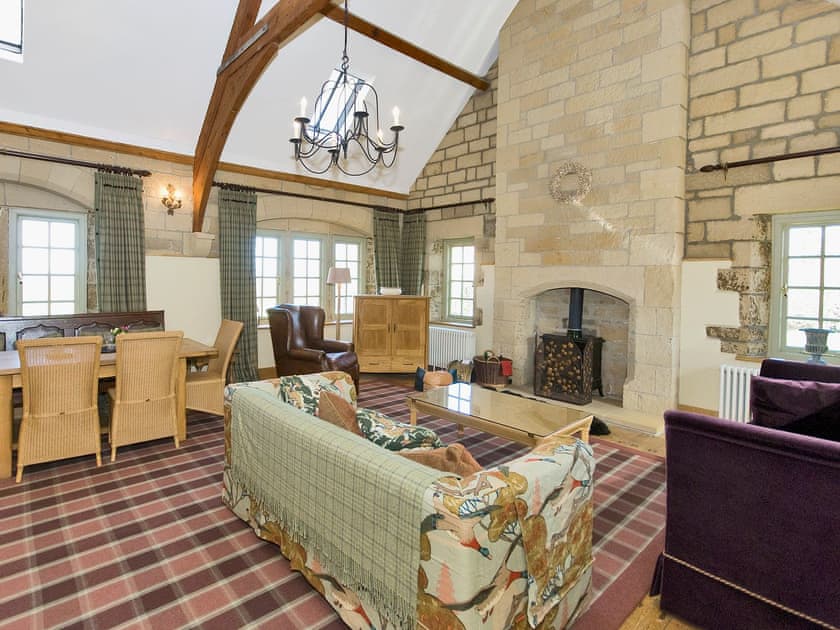 Living/dining room with multi-fuel burner | Old Reading Room, Thimbleby, near Osmotherley