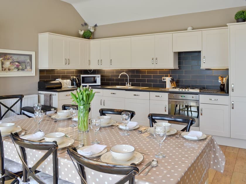 Well-appointed fitted kitchen with dining area | The Pavilion, Killerby, near Scarborough