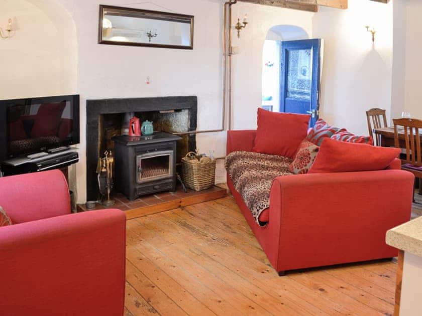 Living area with Multifuel fire | The Cottage, St. Cyrus, Montrose