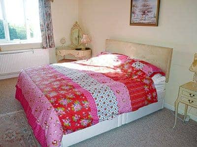 Comfortable super king bedroom  | Westgate Cottage, St Lawrence, near Ventnor