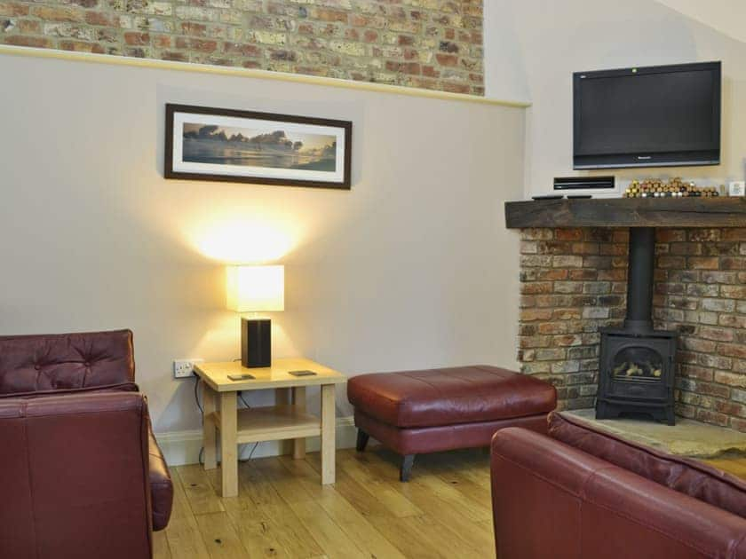 Cosy living room area | Woldsend Holiday Cottages: Rose Cottage - Woldsend Holiday Cottages, Rillington