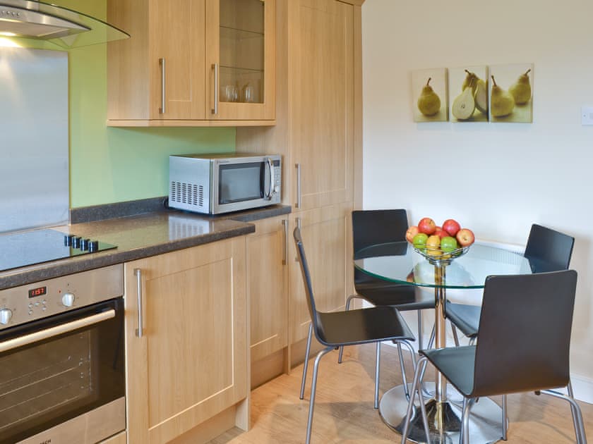 Convenient dining area in well-equipped fitted kitchen | Coastal Retreat, Beadnell